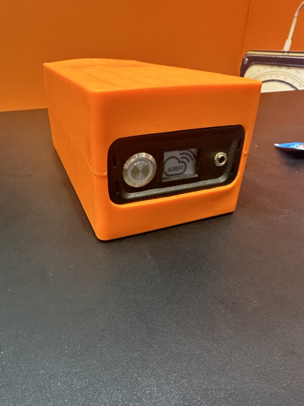 an orange box with a black and silver lock