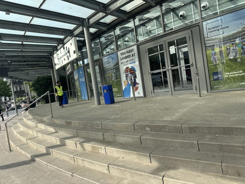 a man walking outside a building