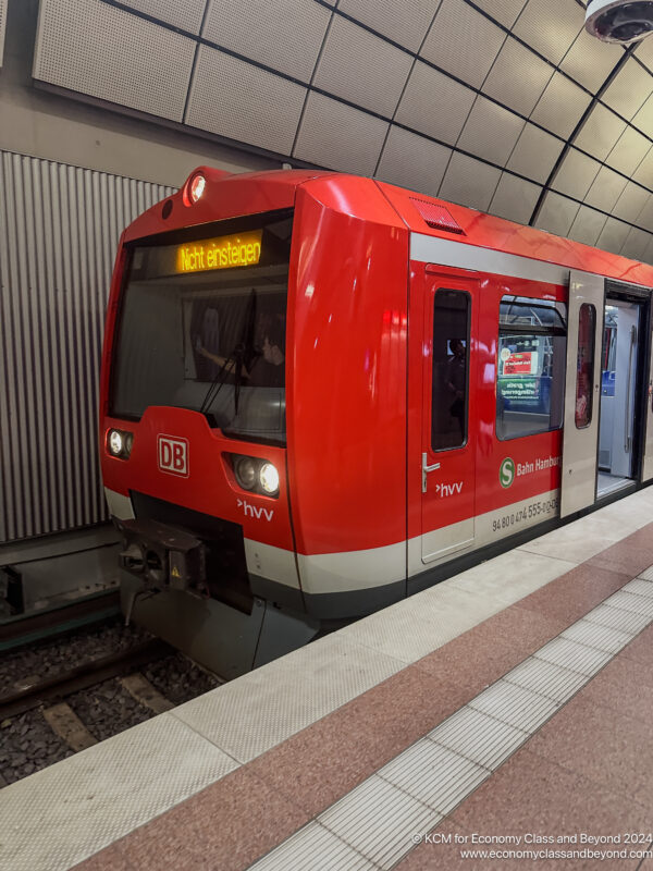 a red train in a station