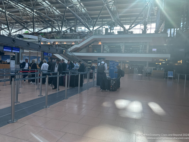 a group of people in an airport