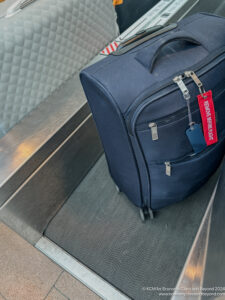 a luggage bag on a luggage carousel