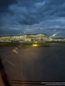 an airplane on the runway at night