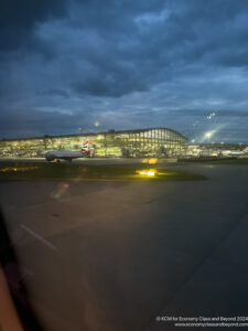 an airplane on the runway at night