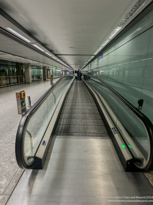 a moving escalator in a airport