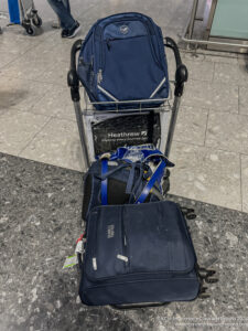 luggage on a cart with luggage on it