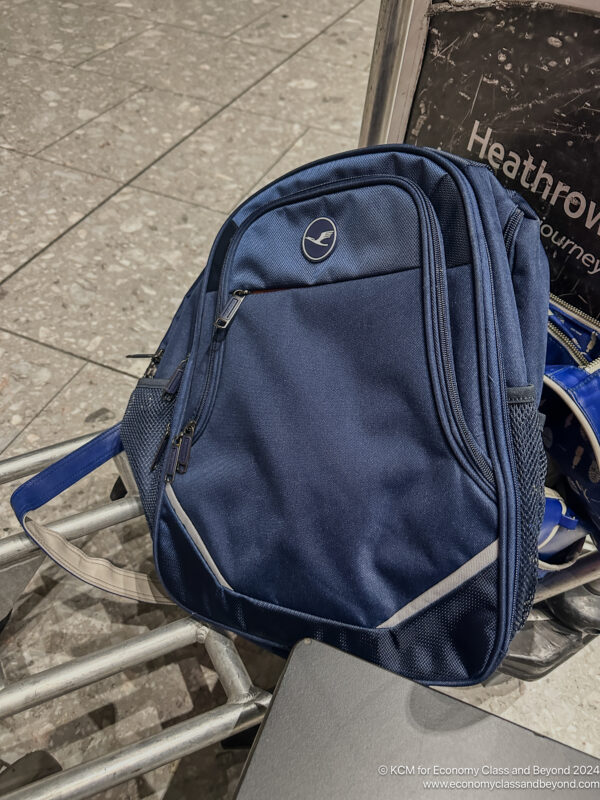 a blue backpack on a cart