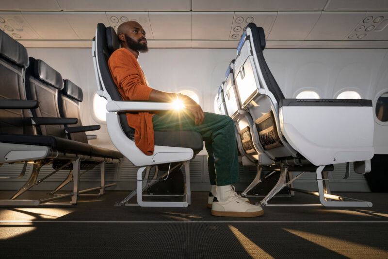 a man sitting in an airplane seat