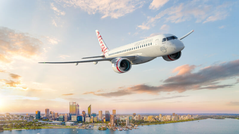 a plane flying over a city