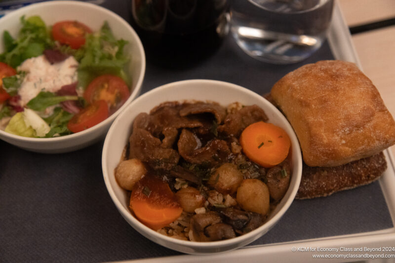 a bowl of food on a tray