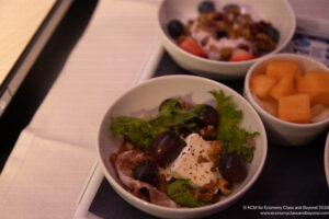 a bowl of food on a tray