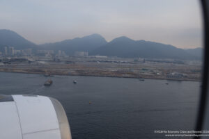 a body of water with a body of water and a city in the background