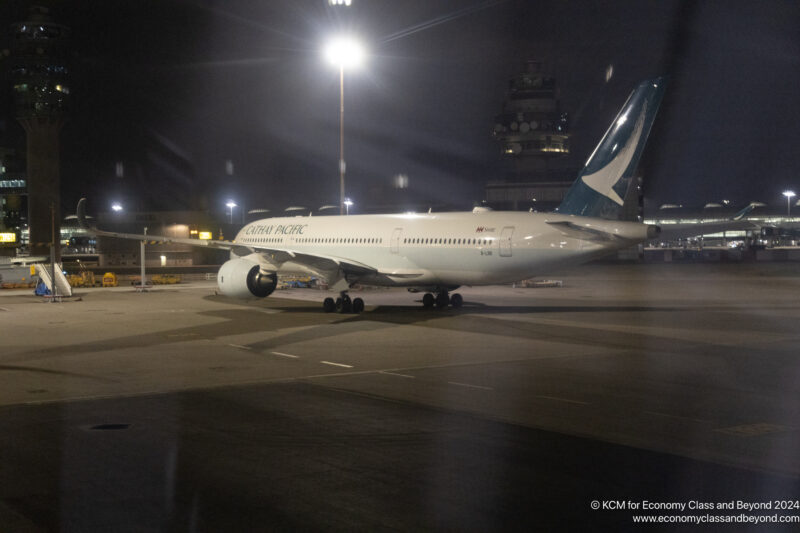 a plane on the runway at night