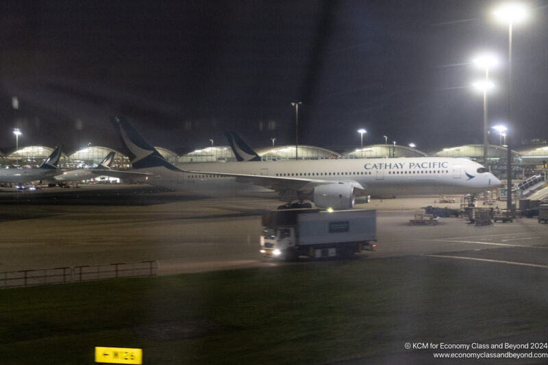 a large airplane on a runway at night