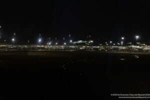 a runway at night with lights