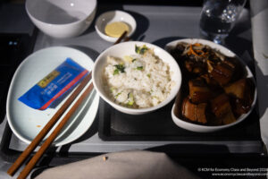 a plate of food on a tray