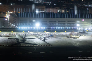 an airplane on a runway at night