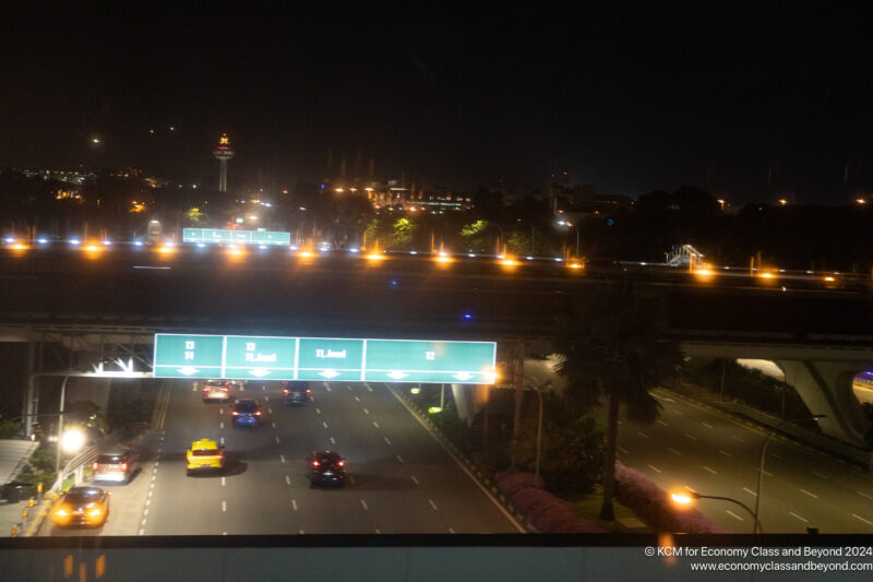 a highway at night with traffic