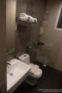 a bathroom with a toilet and sink