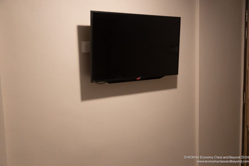 a tv mounted on a wall