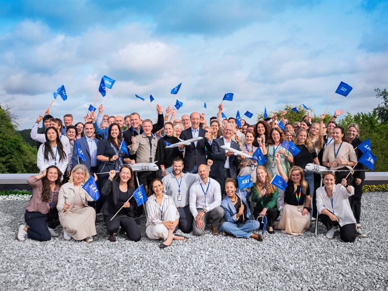 a group of people posing for a photo