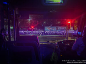 a bus driving at night