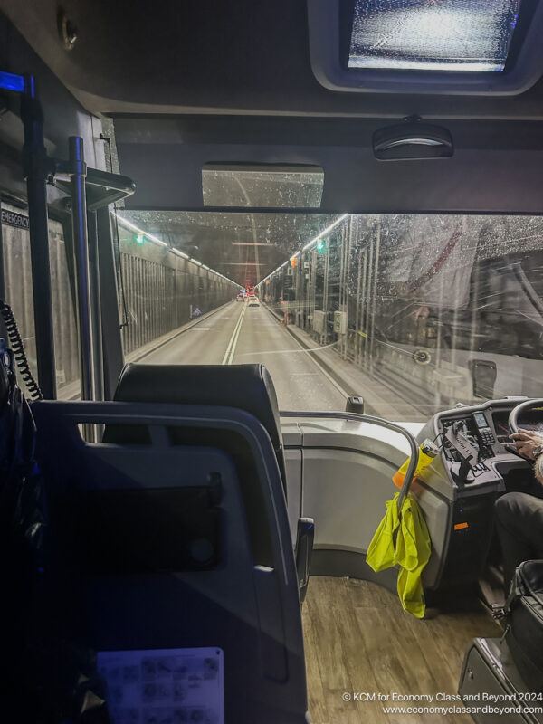 a bus driving down a road