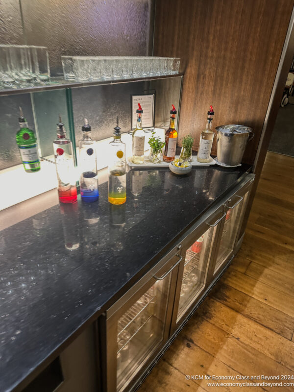 a bar with bottles and glasses