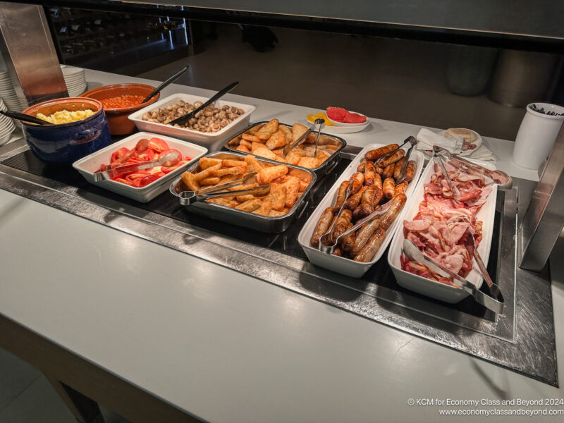 a trays of food on a counter