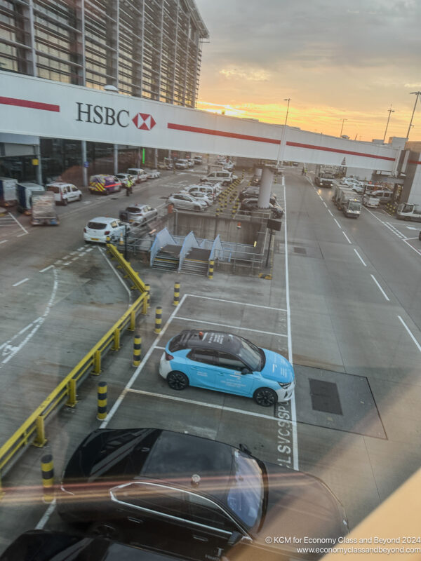 a blue car parked on a road