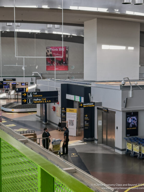 people standing in a terminal