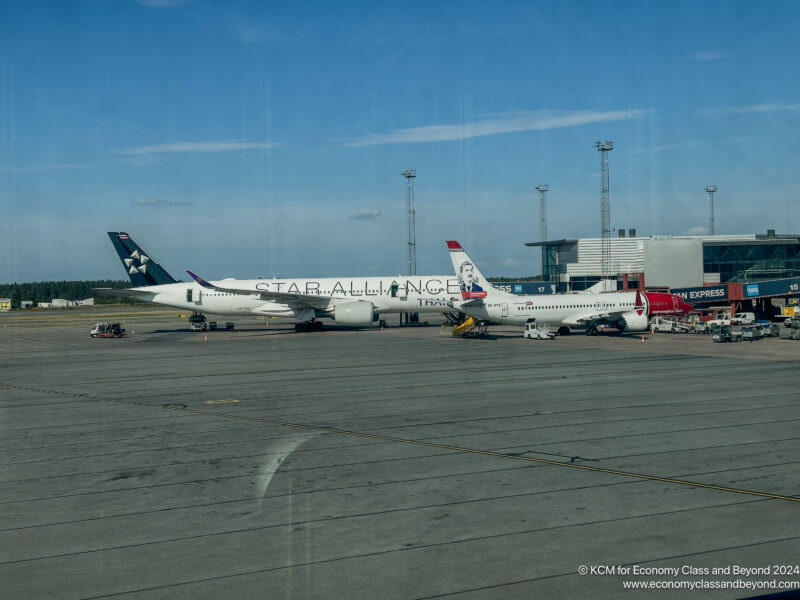 airplanes parked on a tarmac