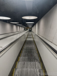 a long escalator in a building