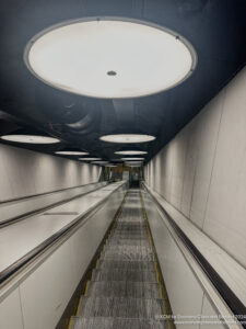 a moving walkway in a building