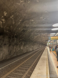 a train tracks in a tunnel