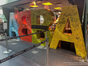 a storefront with a large colorful letters