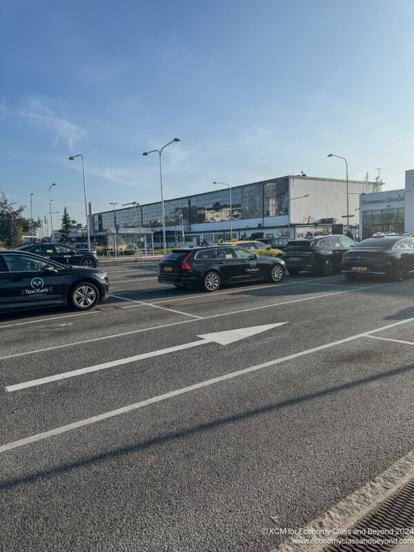 a group of cars parked in a parking lot