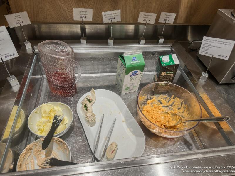 a sink with food items on it