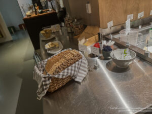 a basket of crackers and other snacks on a counter