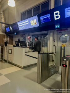 a group of men standing at a counter