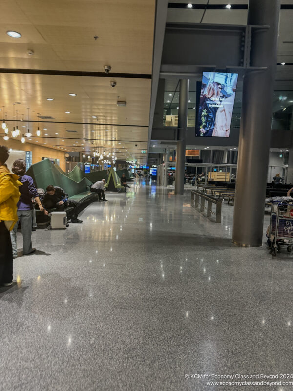 people standing in a hall