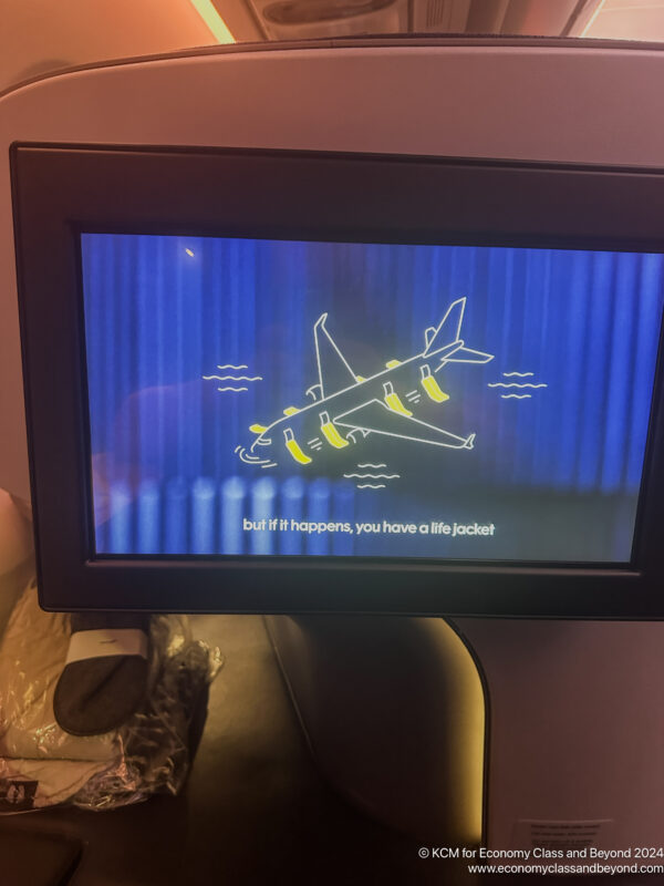 a screen with a cartoon of an airplane on it