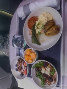 a plate of food on a tray