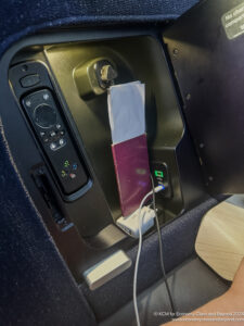 a device with a key and a ticket in it