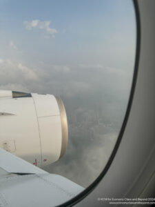 a view of a city from an airplane window