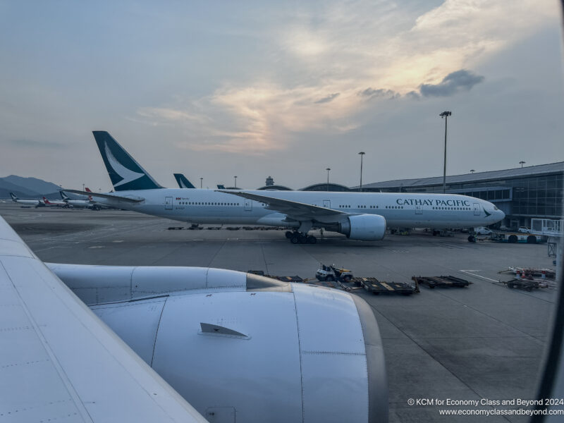 a large white airplanes on a runway