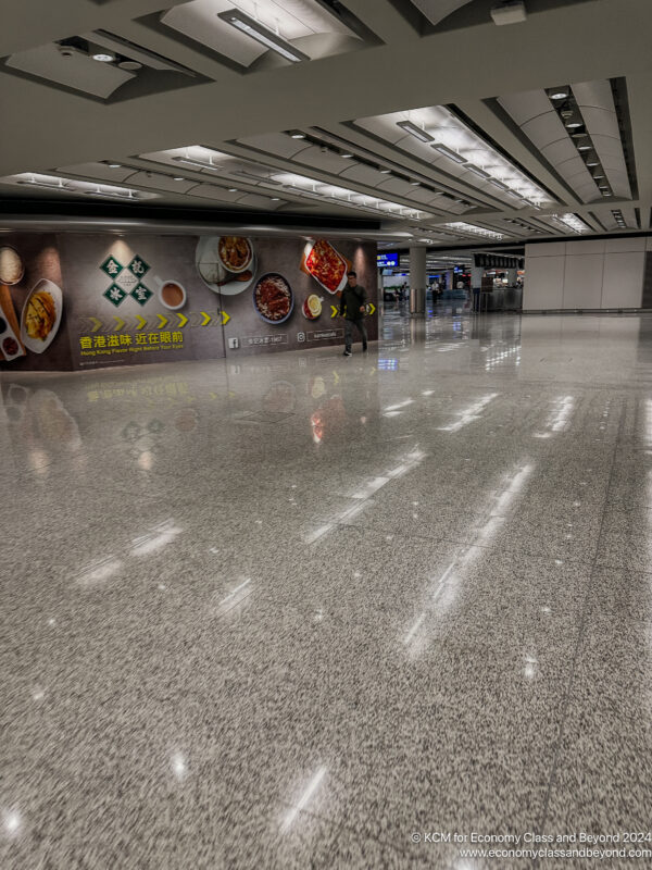 a person walking in a large hall