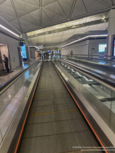 a moving walkway in a building