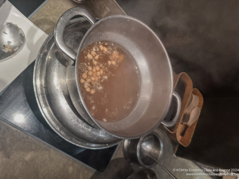 a pot of soup on a stove