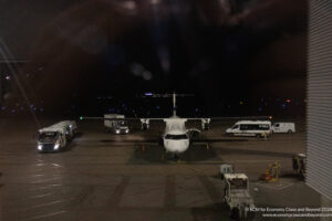 a plane on the tarmac at night