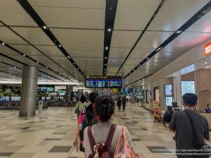 a group of people walking in a terminal